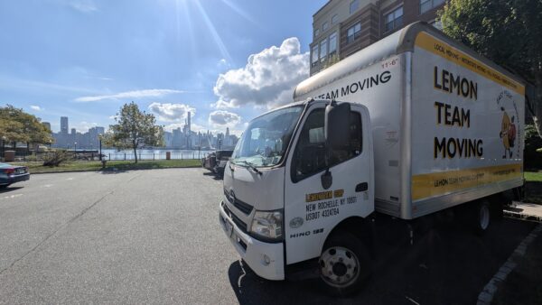 New Rochelle movers loading a truck for a local move